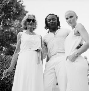 model in white w mum & bf